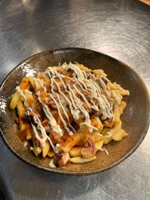 Loaded chips with chicken at The Blueberry Pub