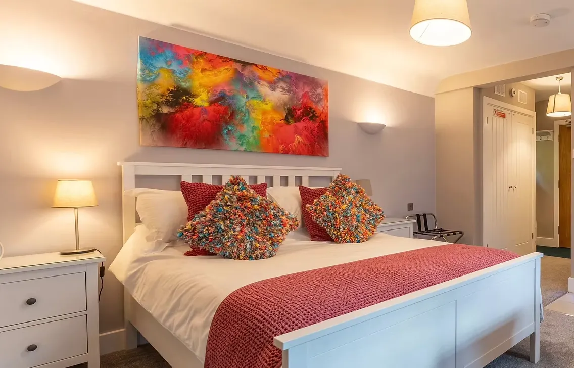 Comfortable double bedroom with modern furnishings at Blueberry Lets